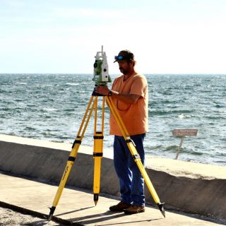 Surveyor with modern survey equipment